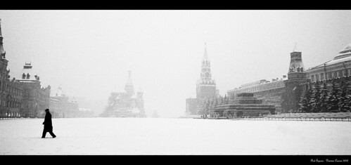 Red Square, Moscow Going through some old film from trips in Europe and came across this. A lone, mysterious man with red square to himself in the dead of a russian winter.   I like the romanticism of the pic. If you have a decent res, best seen large.  *Shot on Ilford XP2 Super* sometime in November, 2002.