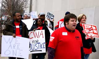 CWA Local 6355 President Bradley Harmon marches with members toward Missouri state capitol on Lobby Day.