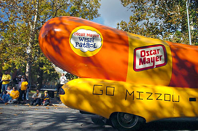 The famous Oscar Mayer Weinermobile sports a homecoming message while rolling down sixth street.<br /><br />Ed Pfueller photo<br />dit/oct 2004/news/Homecoming Parade ep 