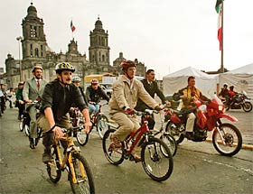 Mexico City Mayor Marcelo Ebrard (center) led a group of cyclists to work in April in the capital.