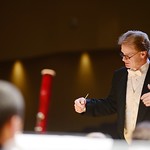 Dr. Greig conducting