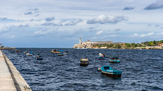 Fisher Boats in front of the Castillo de los Tres