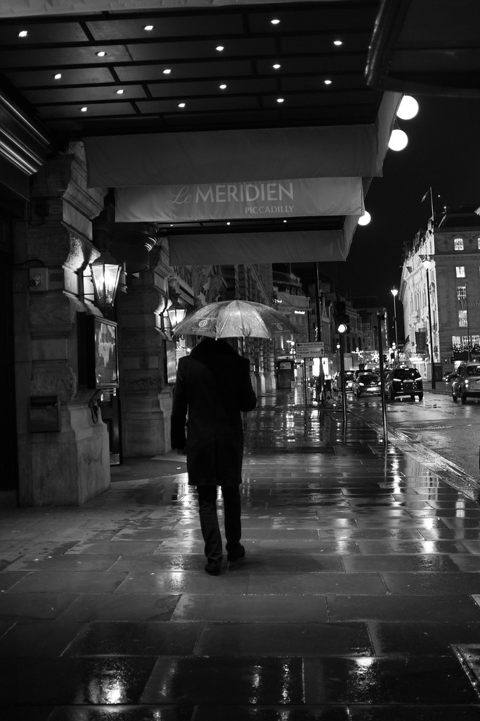 : The man with the umbrella