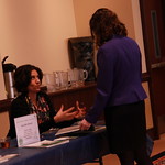 A student networking at a career fair