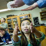 Students performing an experiment.