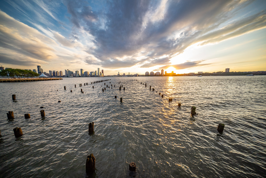 The sunset behind Jersey City from Pier 46 on Manhattan's West Coast.