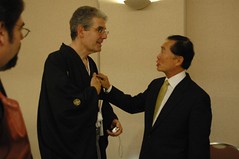 Scott Edelman and George Takei, with klingonguy in the foreground