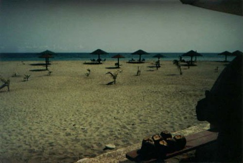 Blue, shadows, sand, umbrellas and coconuts!!