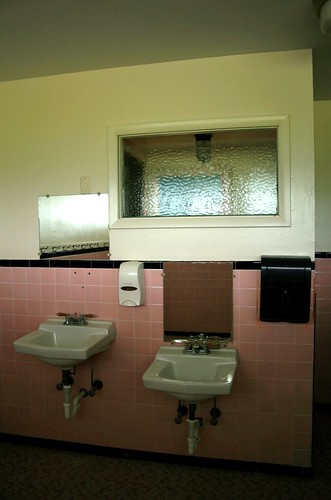 Awkward placement of mirrors in girl's bathroom