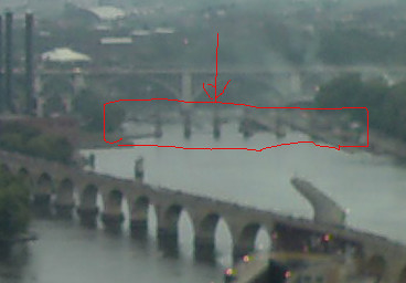 closeup of the collapsed I-35w bridge on Mississippi River