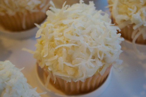 vanilla cupcakes with coconut cream cheese frosting