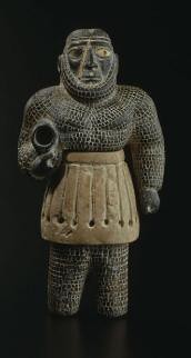 A Western Asiatic Composite Stone Figure of a Mountain God