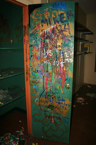 Camp House storage closet employee graffiti (right door)
