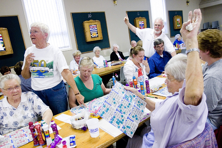 Joan McCullough and Dave Guyett are among the volunteers who help at bingo Tuesday nights.
