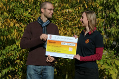 ICT4D.at chairman Florian Sturm receives the donation cheque from Leo Club St. Pölten chairwoman Maria Propst