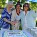 Sr. Frances Ryan, Council of Trustees Co-ordinator Sara Steers, and Principal Colleen Hanycz perform the ceremonial cutting of the cake at the “Brescia in Wonderland” garden party on June 17 in celebration of Brescia University College’s 90th Anniversary