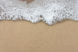 Water Bubbles on Sand Background