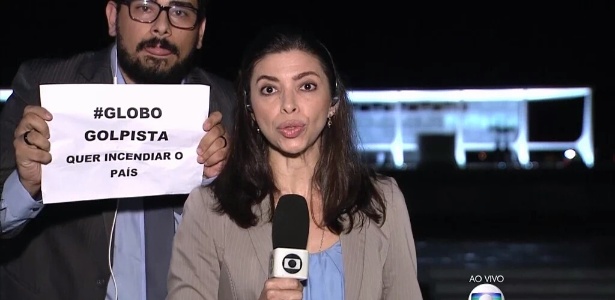 Com cartaz de “Globo Golpista”, homem invade link de jornal da emissora