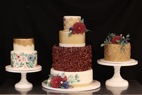 Textured Gold and Burgundy Wedding Cakes Trio