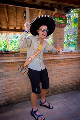 Andrew wearing a traditional sombrero and bandolier at Los Osuna tequila tasting.