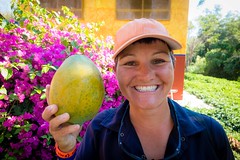 Amanda and a face-sized papaya.