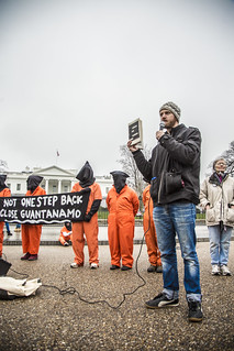 Peace Activist Chris Spicer Holds a Book by Guantánamo Detainee Mohamedou Ould Slahi