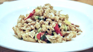Kung Pao Cauliflower: a warm salad of flash-fried cauliflower, edamame, chicken, chili, and peanuts