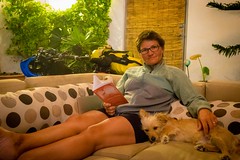 Amanda enjoying downtime with Lefty and a good book.