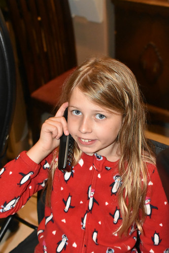 Nora on the phone with Grandma and Grandpa • <a style="font-size:0.8em;" href="http://www.flickr.com/photos/96277117@N00/26094904583/" target="_blank">View on Flickr</a>