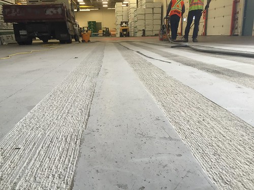 Fine grind of surface to minimize slipping of forklift traffic.