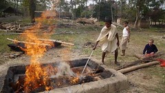 hot! preparing fire for boiling sugar cane juice