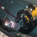 Sailor performs an underwater fillet weld in a training pool at the ROK engineering school .