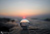 Sunset on the beach, in a crystal ball