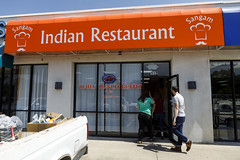 0531 Ranjani and Chris walk into Sangam Indian Restaurant