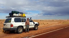 Bob with his vehicle, near Coober Pedy