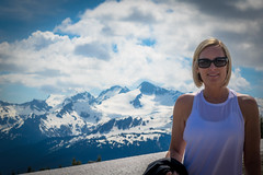 Tracey hiking up to the Top of the World run in Whistler.