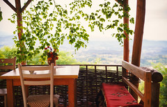 Village Balcony With Table and Chairs