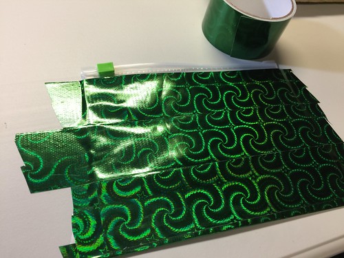 cover the bag with duct tape - dollar store craft