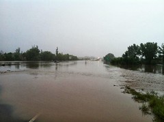 The Big Thompson River rises enough to cover I-25 just south of Highway 34 on September 13, 2013. (Colorado State Patrol)