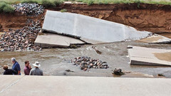 Flood damage at Rocky Mountain Arsenal National Wildlife Refuge on September 13, 2013 where water carved an 8' deep gulley. (Adams County)