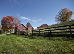 Grouping of small barns in this Monroe County, West Virginia, autumnal rural scene. Original image from Carol M. Highsmith’s America, Library of Congress collection. Digitally enhanced by rawpixel.