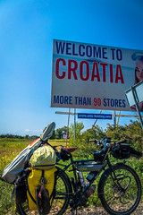 This is about as close as we could get to a welcome to Croatia sign and it was advertising some stores.