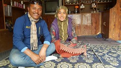 Hussain (driver) and his wife at home in a village near Purtikchey
