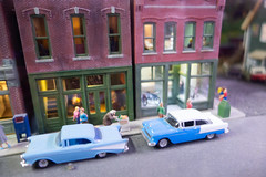 Classic cars parked at the model railway