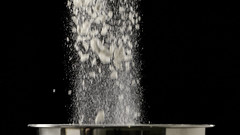 1002 Flour falls into a metal bowl (EVA1 frame)
